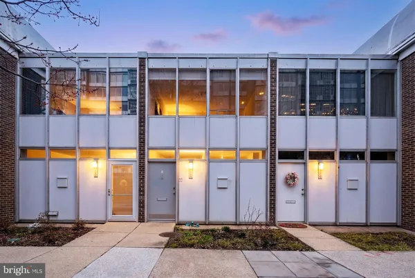 a view of multiple houses with a yard