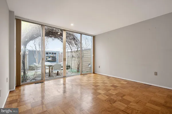 a view of an empty room with a window
