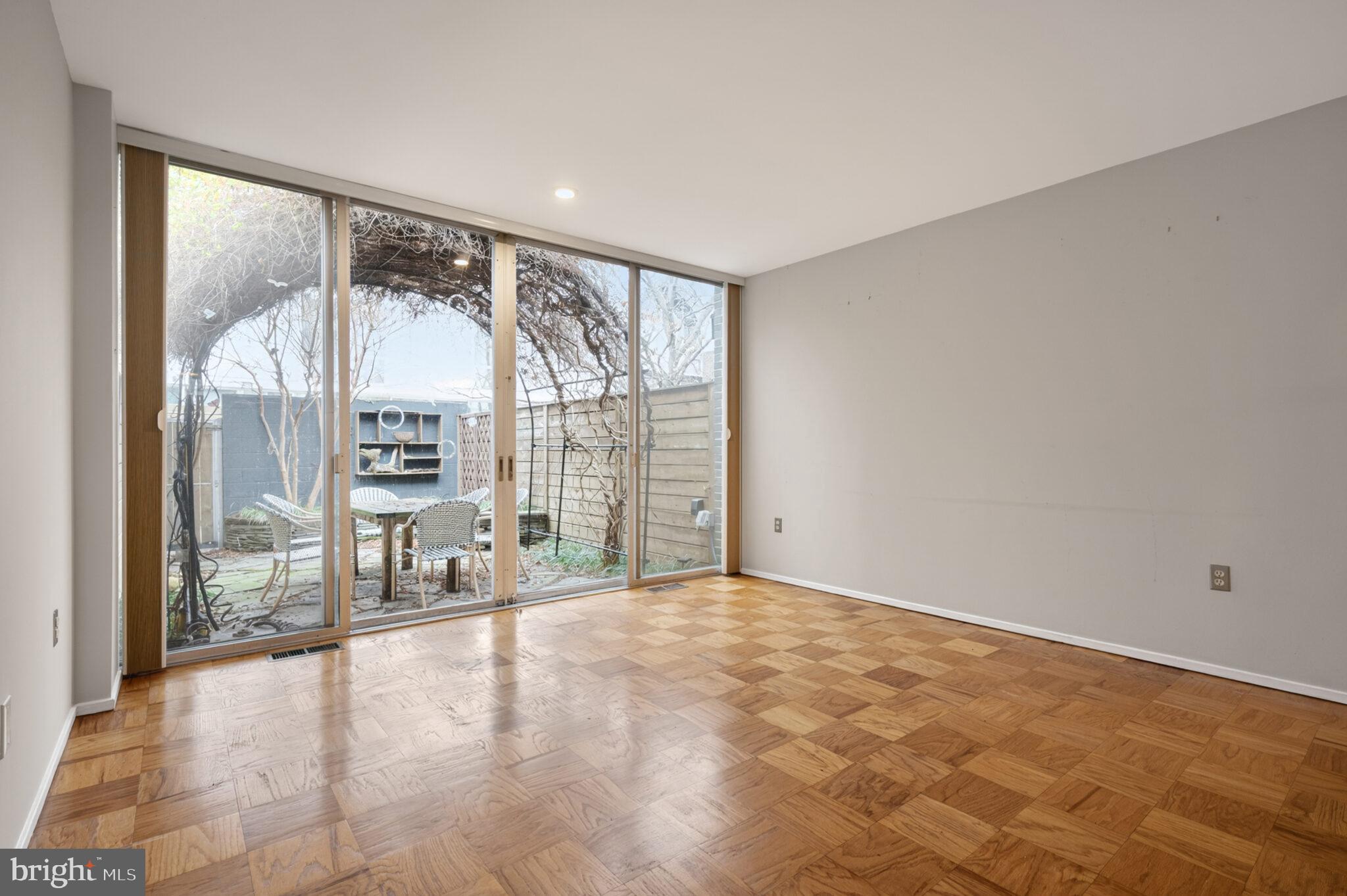 302 N Street Southwest, Unit 302 Washington, DC 20024 - Photo 13 of 68 a view of an empty room with a window