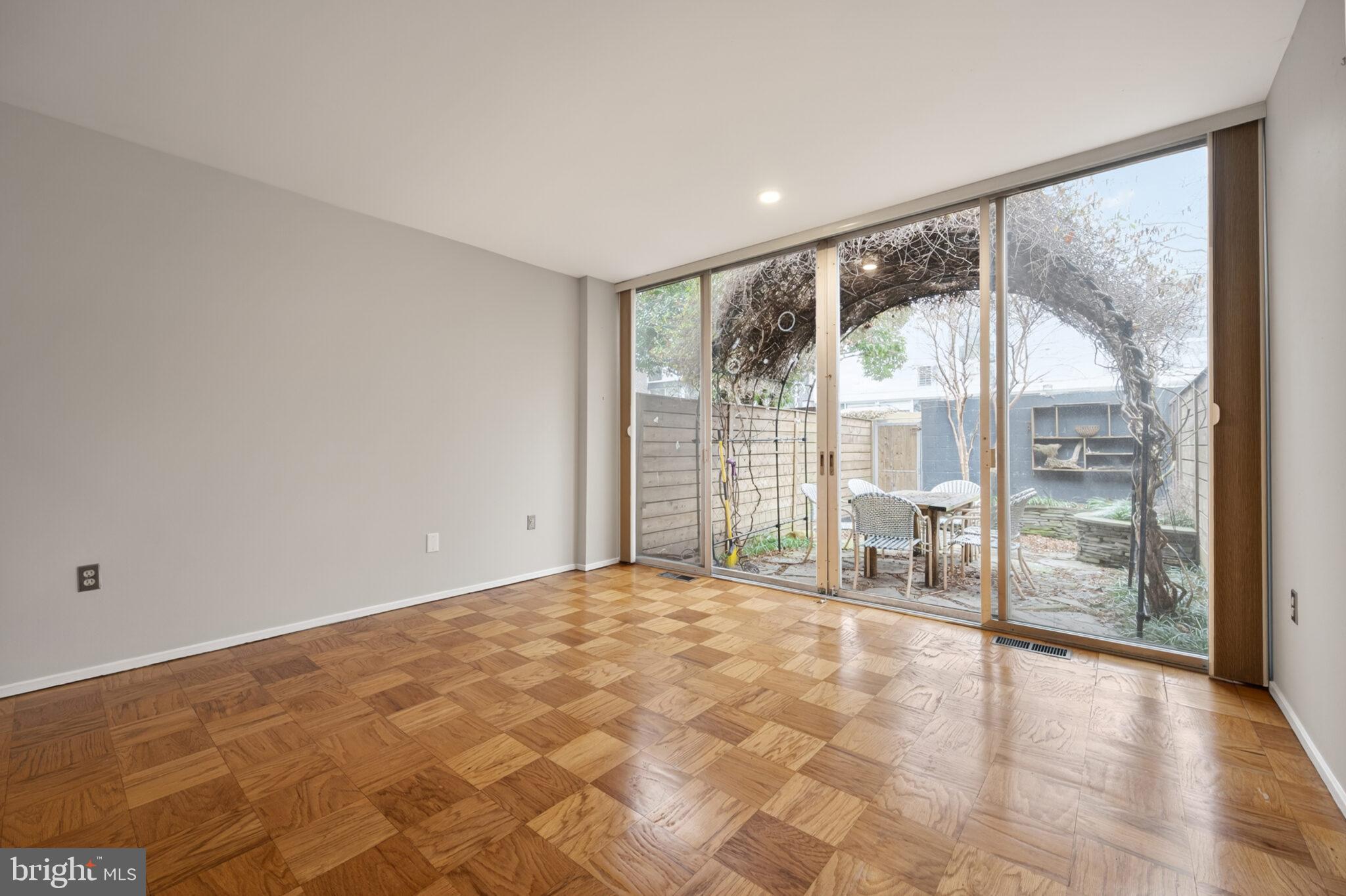 302 N Street Southwest, Unit 302 Washington, DC 20024 - Photo 14 of 68 a view of an empty room and window