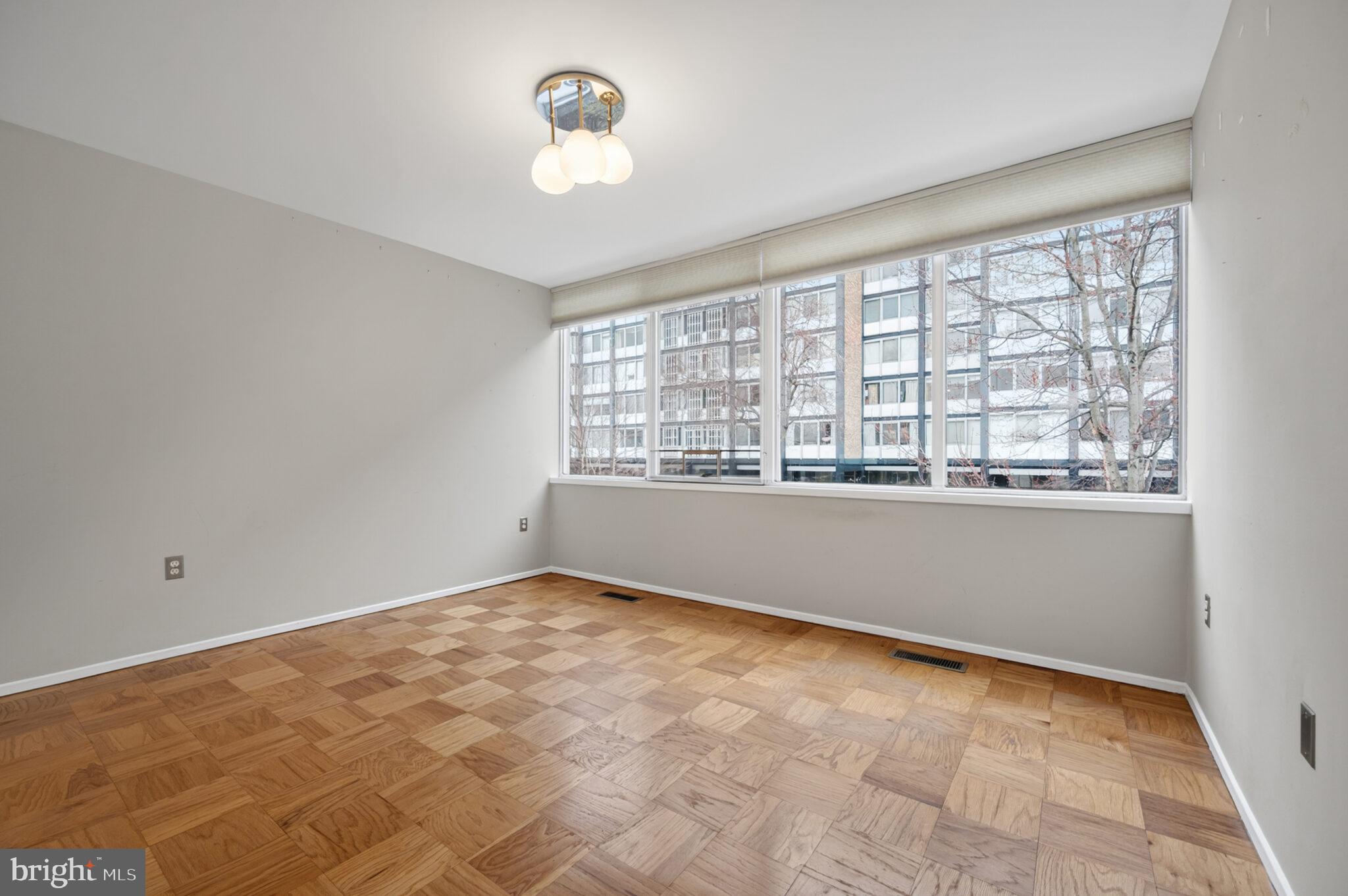 302 N Street Southwest, Unit 302 Washington, DC 20024 - Photo 18 of 68 a view of an empty room with a window