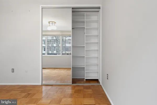 a bathroom with a shower and toilet