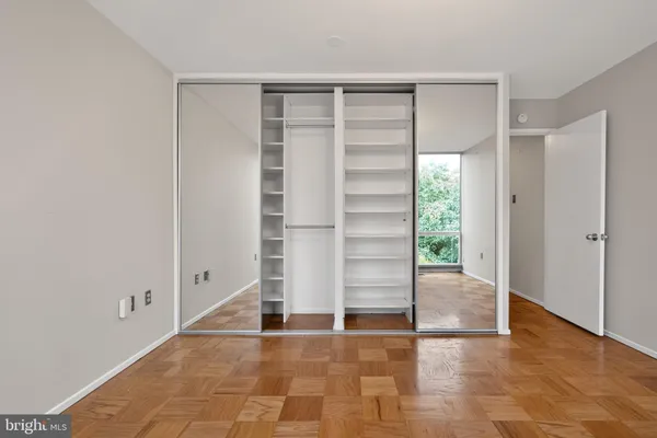 a view of a chairs and table in backyard