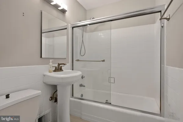 a view of a chairs and table in backyard