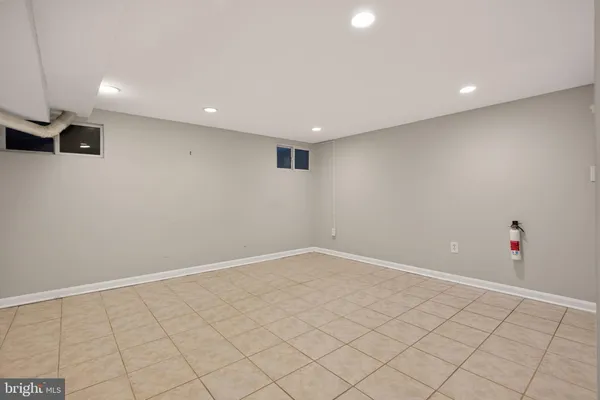 a view of a garden filled with lots of potted plants