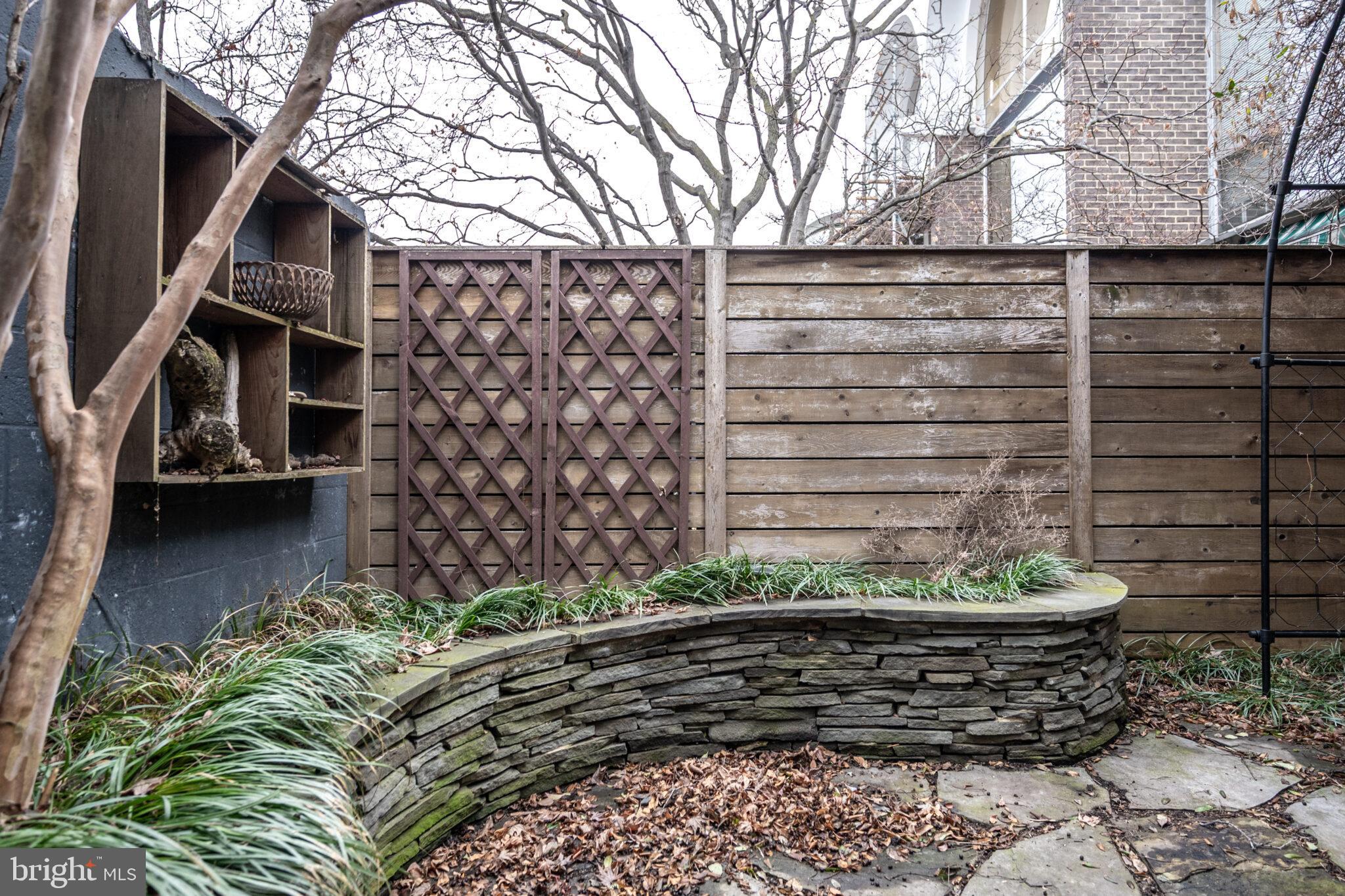 302 N Street Southwest, Unit 302 Washington, DC 20024 - Photo 36 of 68 a view of a garden filled with lots of potted plants