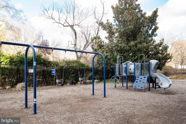 a view of a building with a yard