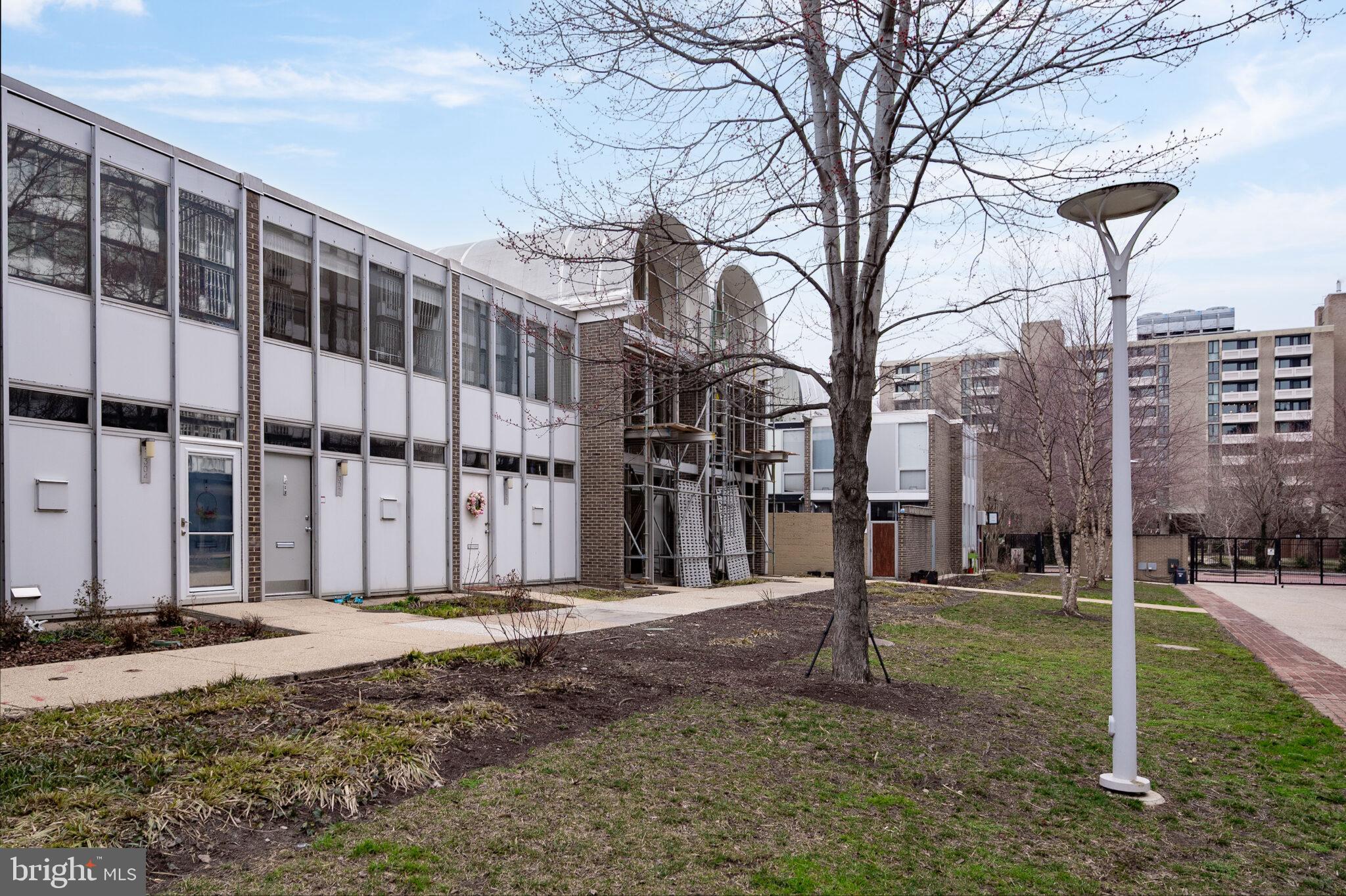 302 N Street Southwest, Unit 302 Washington, DC 20024 - Photo 68 of 68 a view of a building with a yard