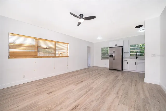 a view of an empty room with a window