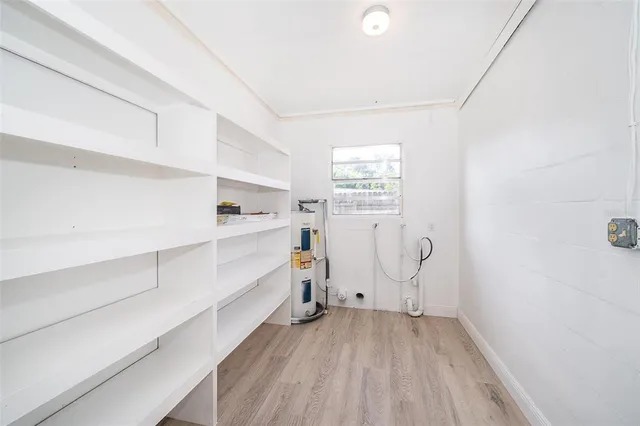 a view of a room with racks on the wall