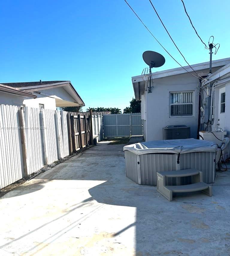 12441 Southwest 190th Terrace Miami, FL 33177 - Photo 5 of 24 a view of a porch with furniture