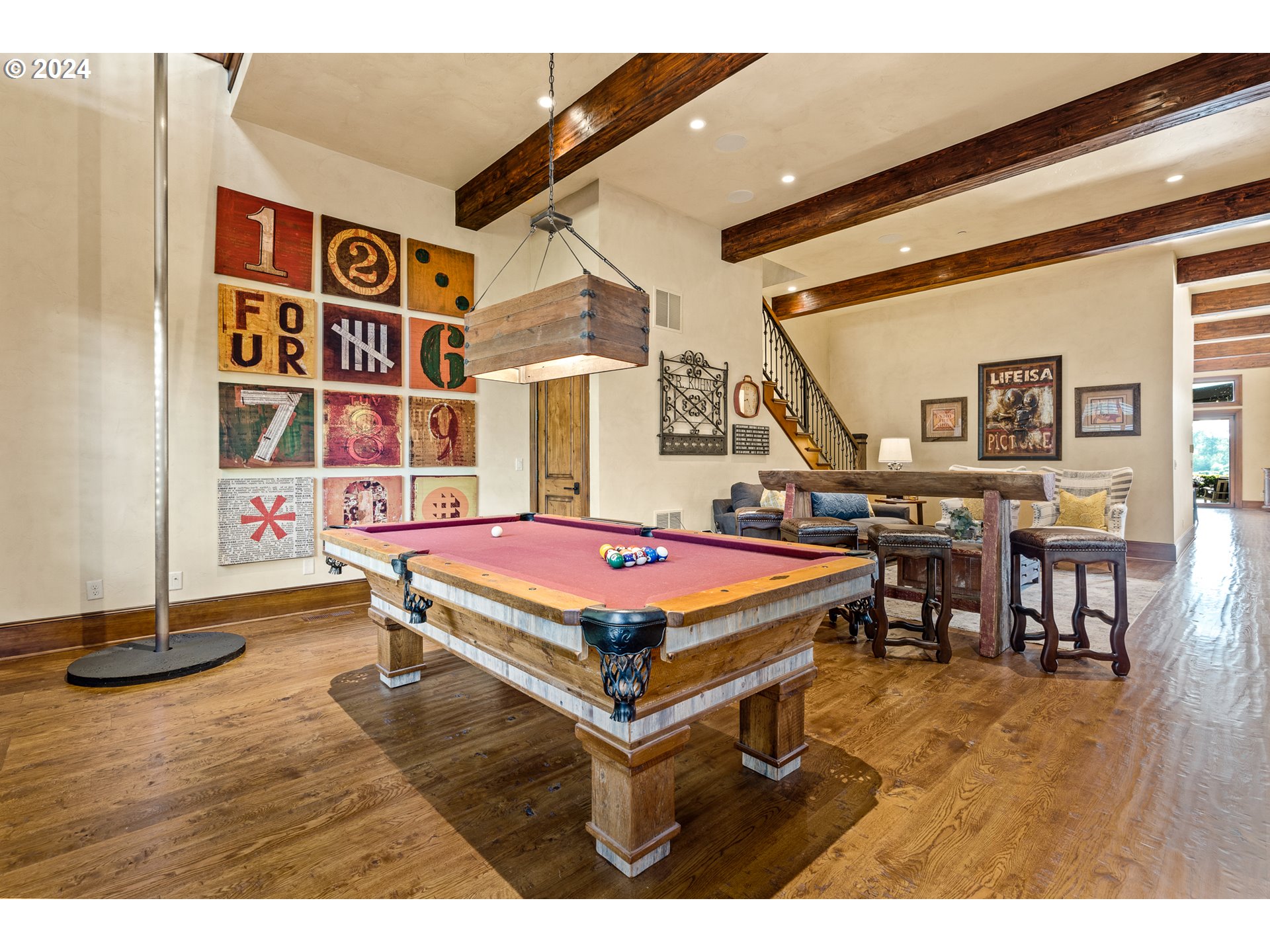 12780 South Fielding Road Lake Oswego, OR 97034 - Photo 27 of 48 a living room with furniture a table and wooden floor
