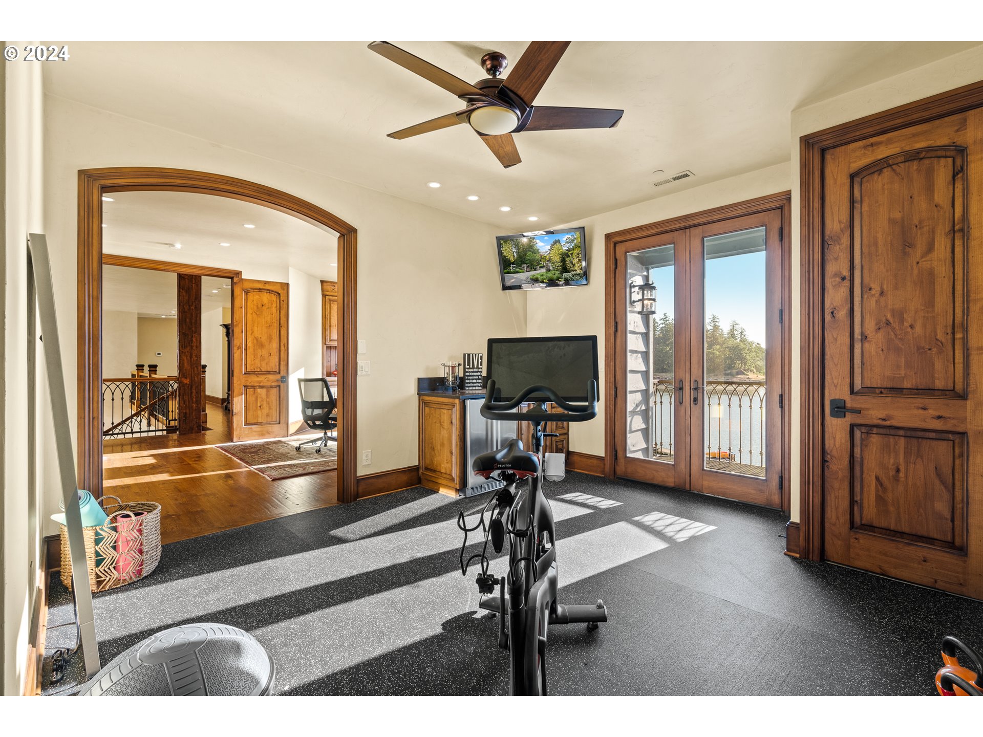 12780 South Fielding Road Lake Oswego, OR 97034 - Photo 29 of 48 a view of a livingroom with furniture a flat screen tv