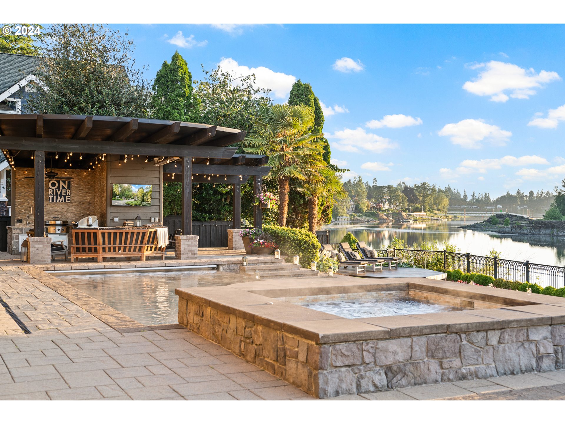 12780 South Fielding Road Lake Oswego, OR 97034 - Photo 6 of 48 a view of a house with a swimming pool
