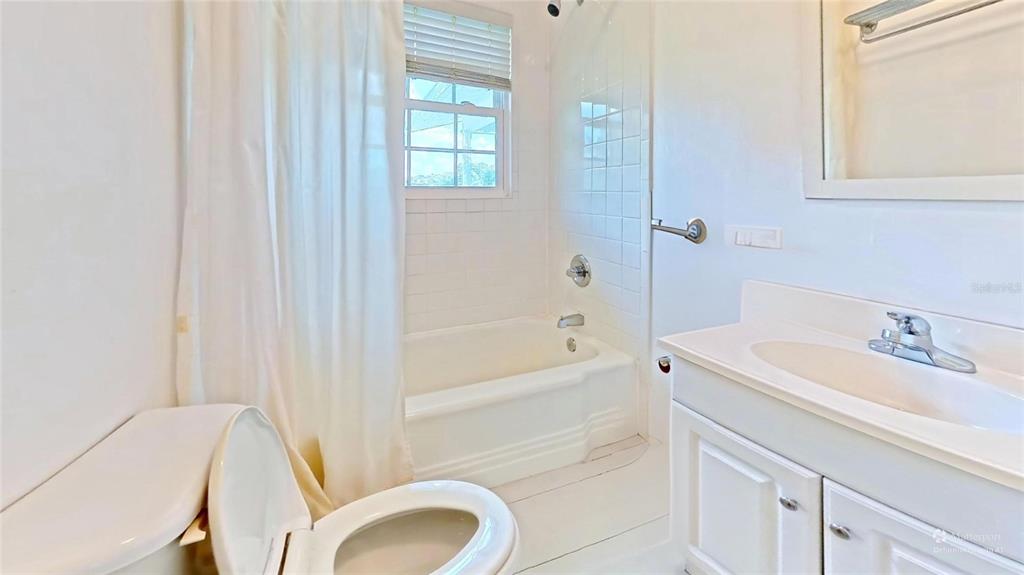 7390 South Mc Alpin Road McAlpin, FL 32062 - Photo 24 of 53 a bathroom with a sink a toilet and shower
