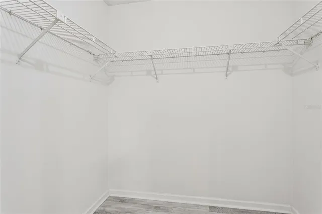 a view of a room with racks on the wall