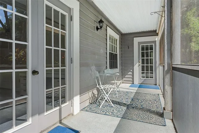 a front view of a house with a glass door