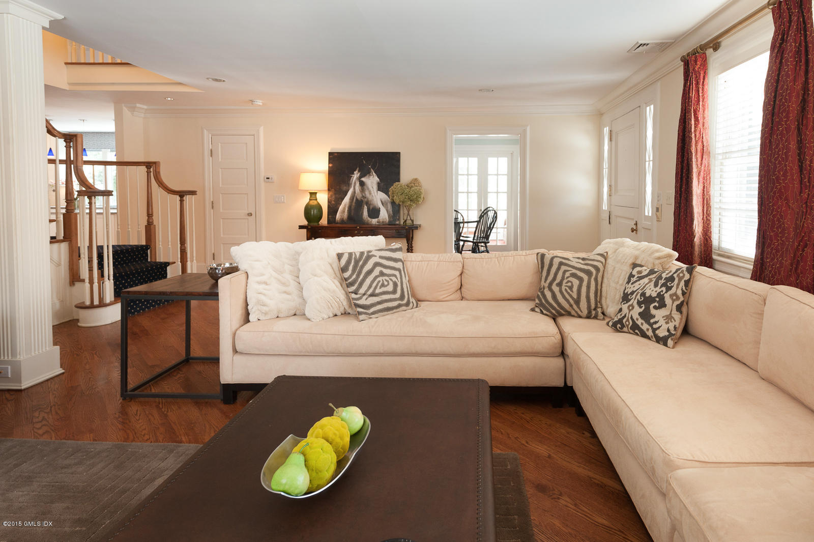49 Indian Field Road Greenwich, CT 06830 - Photo 5 of 28 a living room with furniture and a wooden floor