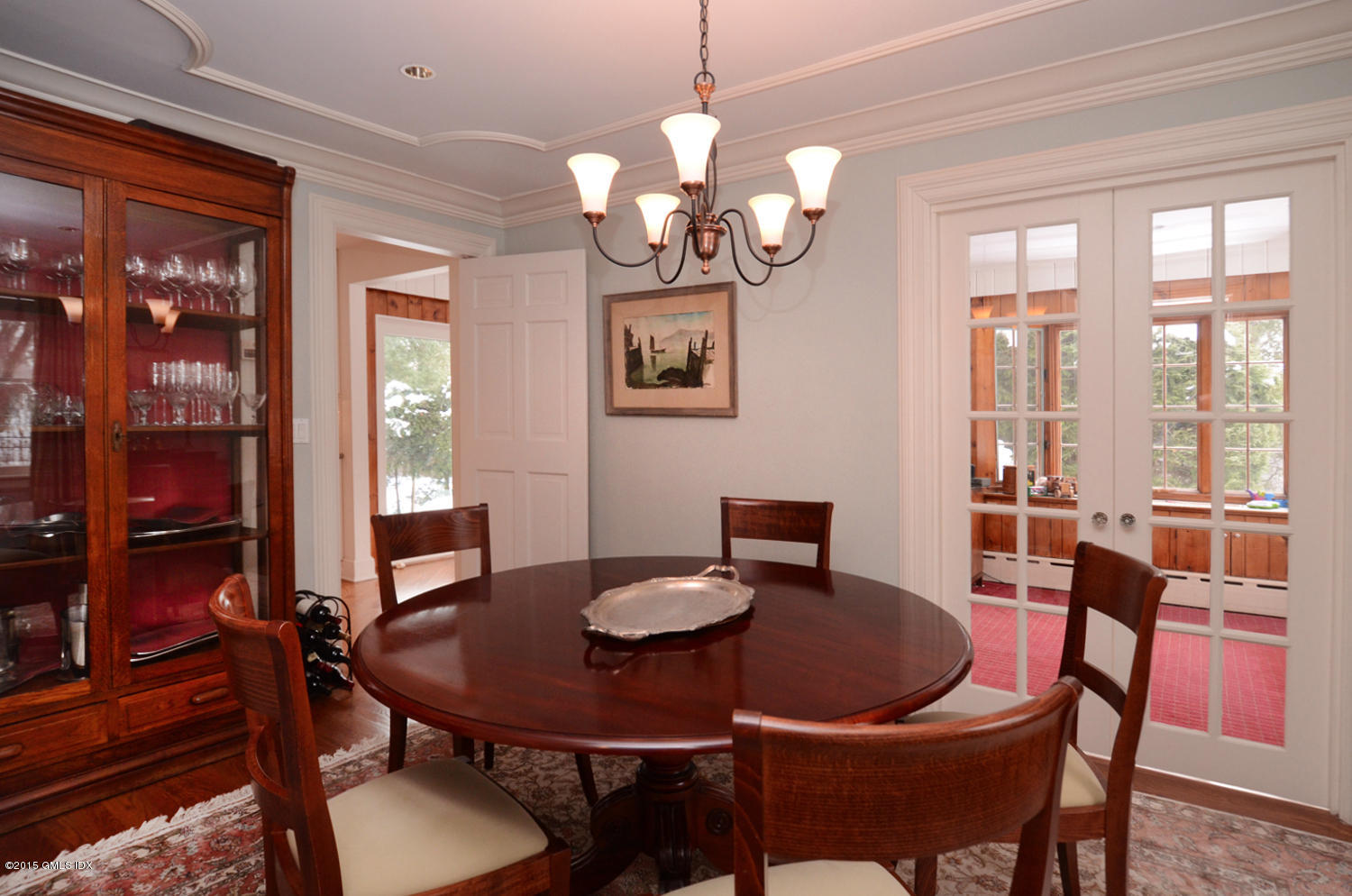 49 Indian Field Road Greenwich, CT 06830 - Photo 7 of 28 a view of a dining room with furniture wooden floor and chandelier