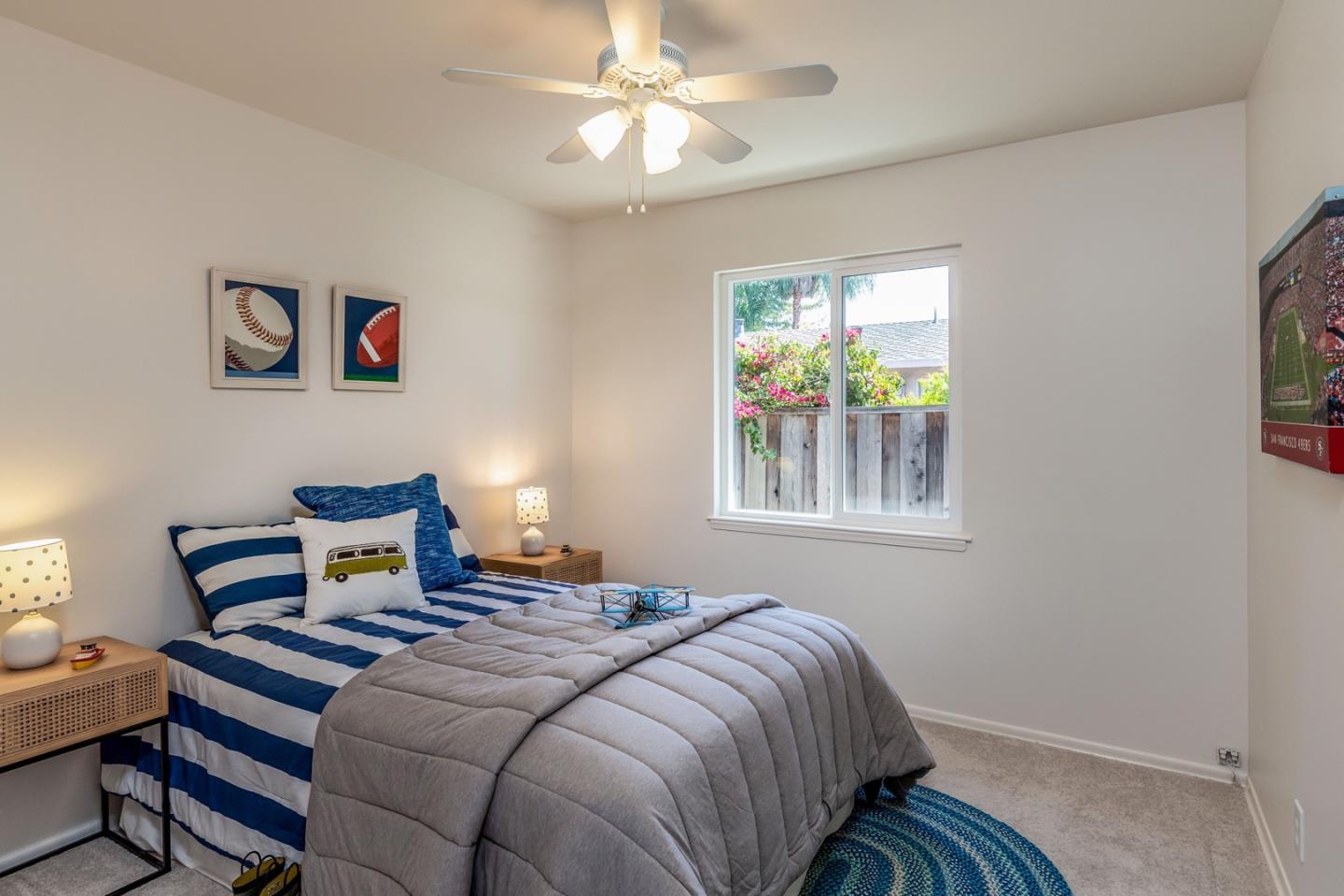 866 Stonehurst Way Campbell, CA 95008 - Photo 11 of 18 a bedroom with a bed a window and a chandelier