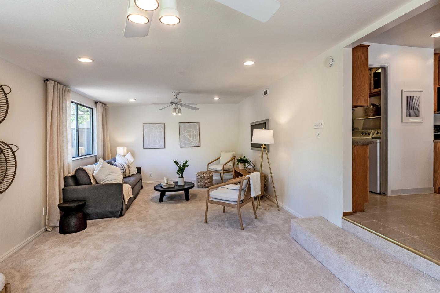 866 Stonehurst Way Campbell, CA 95008 - Photo 7 of 18 a living room with furniture a window and a chandelier