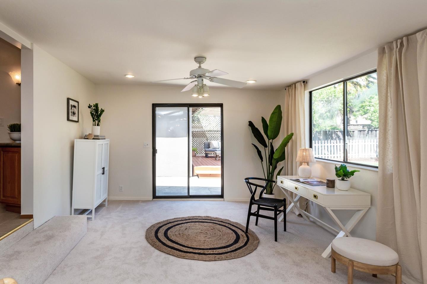 866 Stonehurst Way Campbell, CA 95008 - Photo 8 of 18 a living room with furniture a window and a chandelier