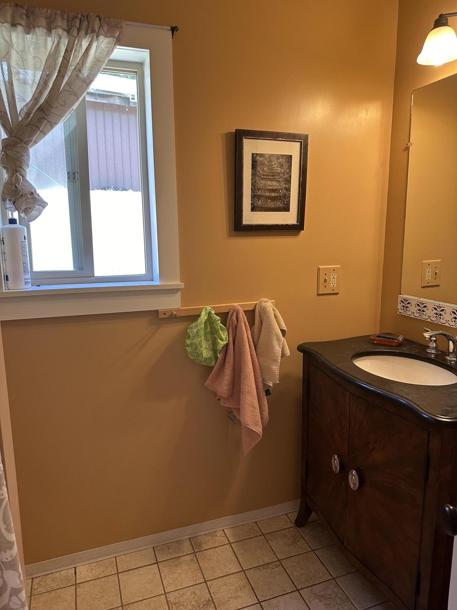 83000 Milstead Road Garberville, CA 95542 - Photo 15 of 67 a bathroom with a sink and a mirror