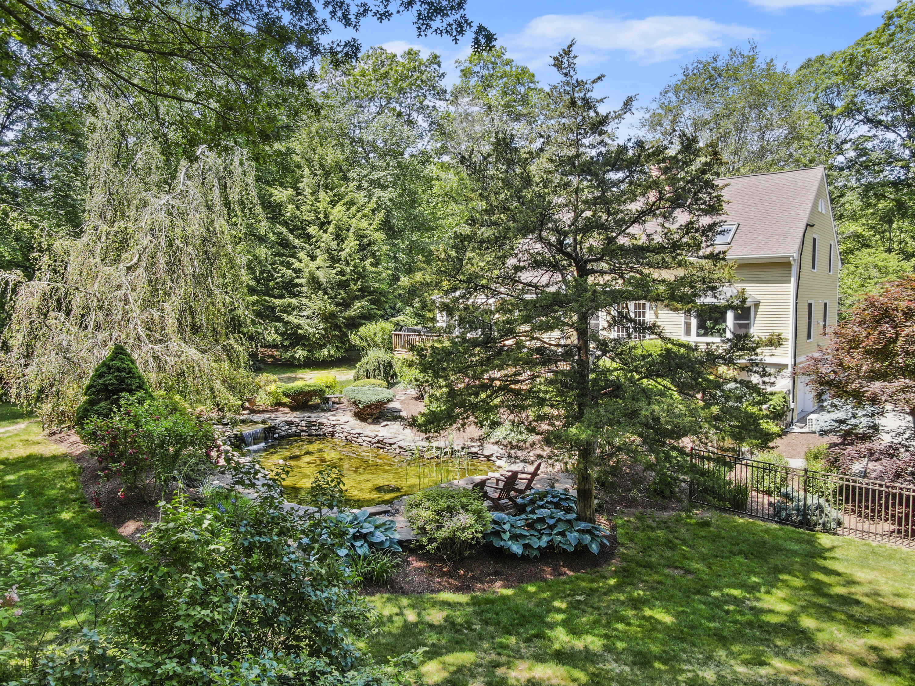 17 Middlebrook Pond Road Redding, CT 06896 - Photo 33 of 40 an aerial view of residential house with outdoor space and trees all around