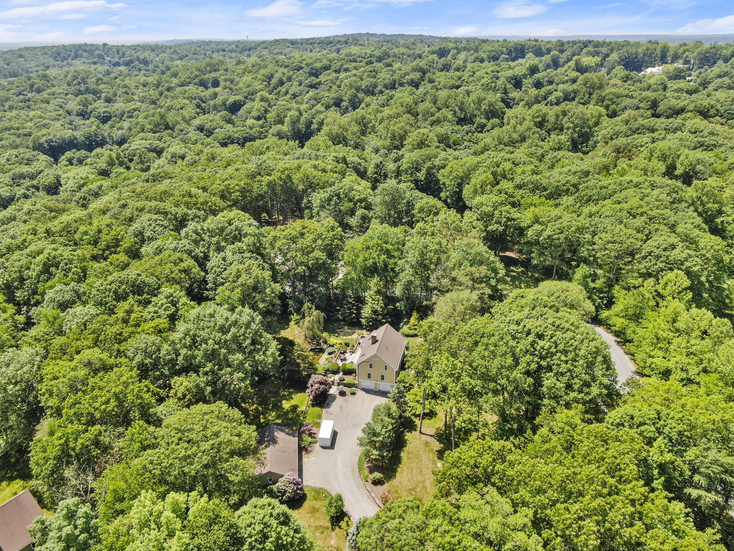 17 Middlebrook Pond Road Redding, CT 06896 - Photo 36 of 40 a view of a large yard with lots of bushes