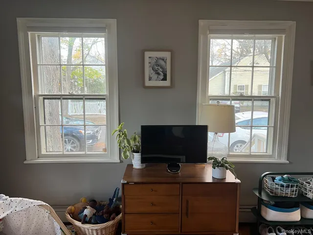 a room with toys and wooden floor
