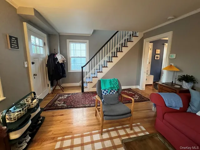 a view of a livingroom with furniture and windows