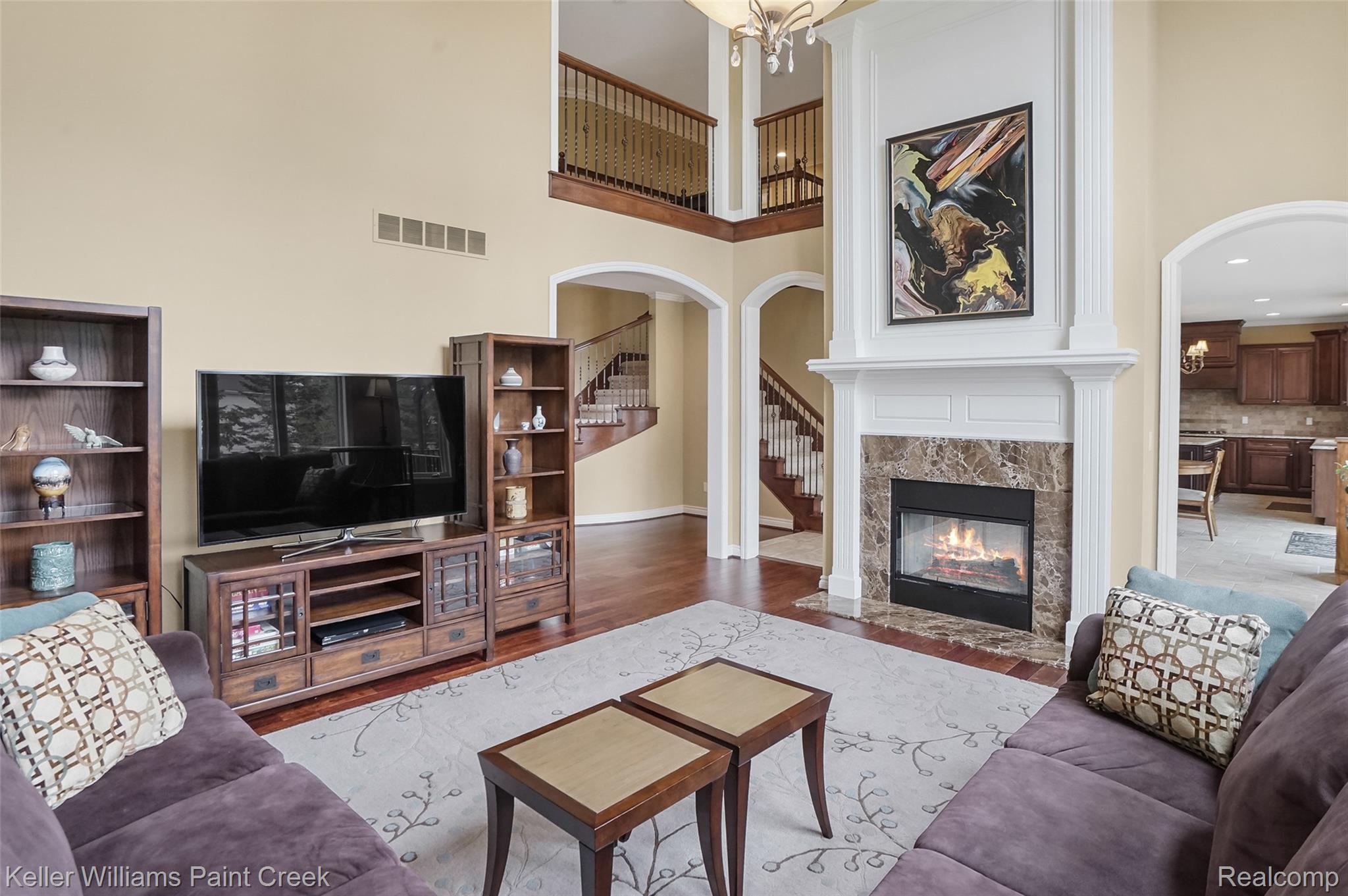 2757 North Addison Circle Rochester, MI 48306 - Photo 23 of 67 The 2-way fireplace and overlooks from the 2nd floor make this such a warm & inviting space