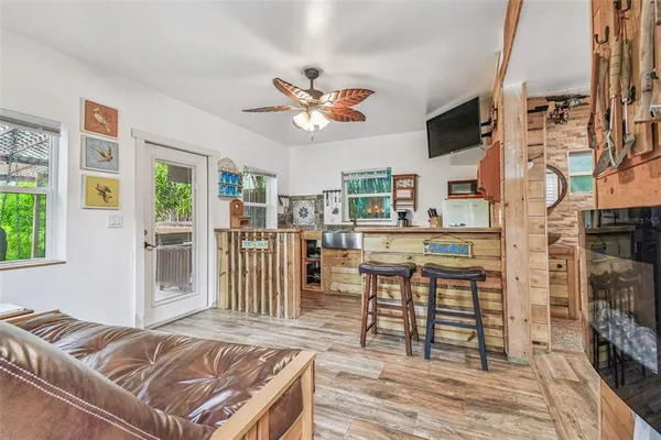 a kitchen with a stove and a refrigerator