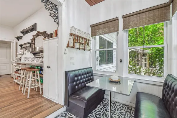 a bathroom with a toilet sink and shower