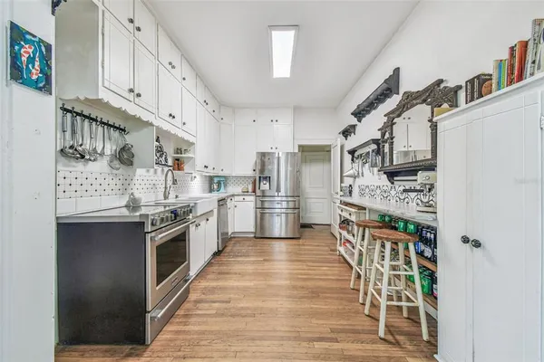 a bedroom with furniture and window