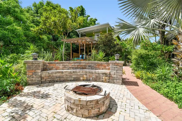 a backyard of a house with lots of green space