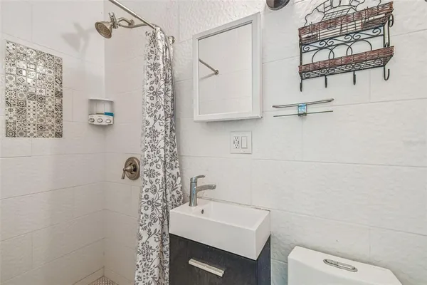 a view of a swimming pool with a seating space