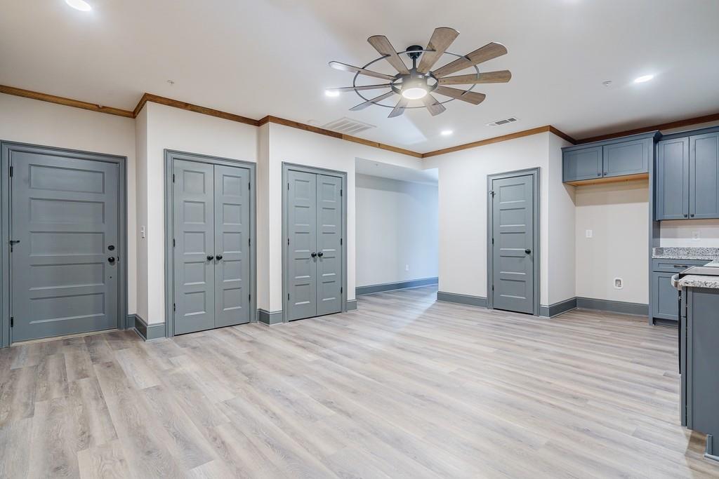 34 Depot Street, Unit 22 Hartwell, GA 30643 - Photo 5 of 29 an empty room with closet and fan