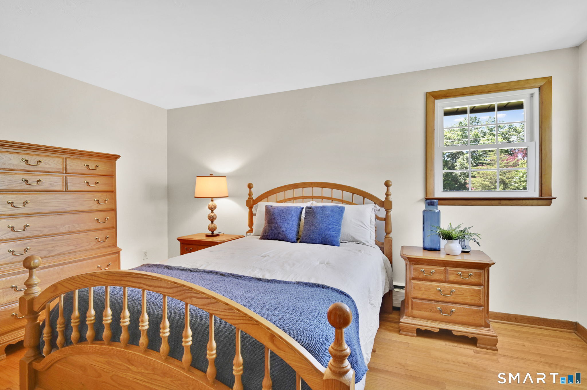 296 Phoenix Street Vernon, CT 06066 - Photo 14 of 34 a bedroom with a bed and a window