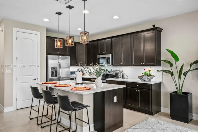 a living room with furniture a window and a table
