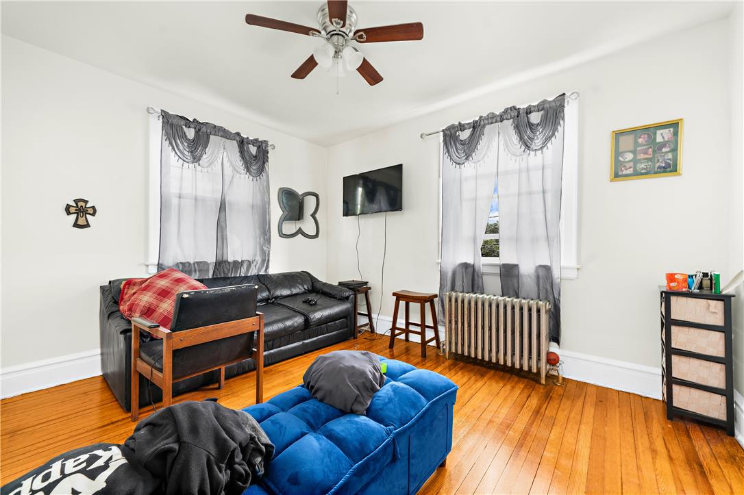 2055 Ferry Street Wilson, PA 18042 - Photo 17 of 21 This inviting living space features gleaming hardwood floors and ample natural light, perfect for everyday living.