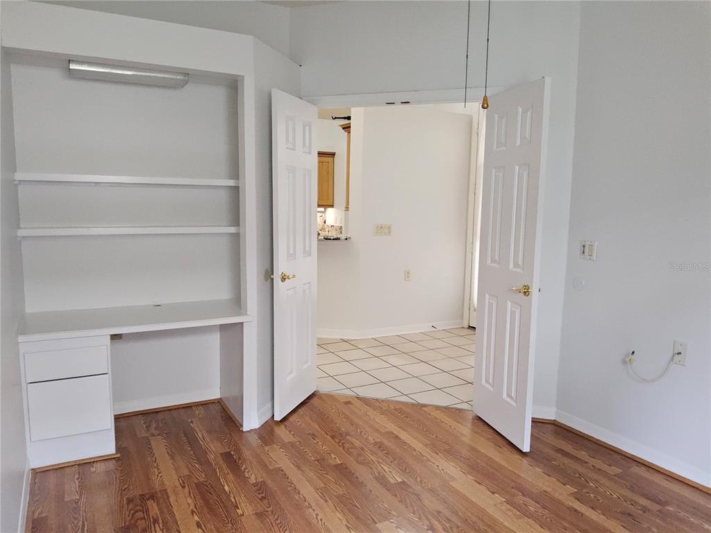 8023 St Andrews Way Mount Dora, FL 32757 - Photo 10 of 28 a view of a bathroom with wooden floor