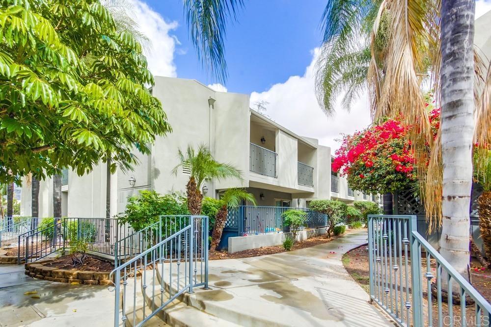 1045 Peach Avenue, Unit 12 El Cajon, CA 92021 - Photo 7 of 29 a front view of house with sign board and yard