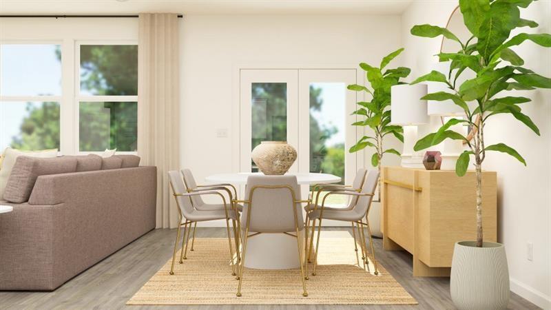 292 Vision Street Bethlehem, GA 30620 - Photo 19 of 21 a living room with furniture and a potted plant