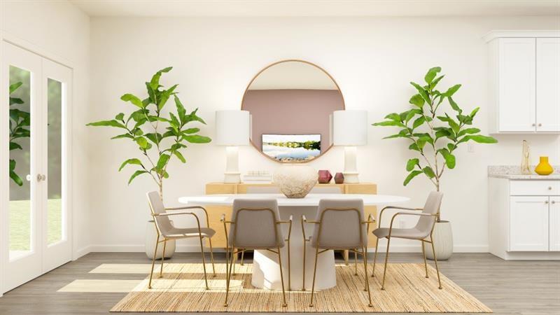 292 Vision Street Bethlehem, GA 30620 - Photo 4 of 21 a dining room with furniture and a potted plant