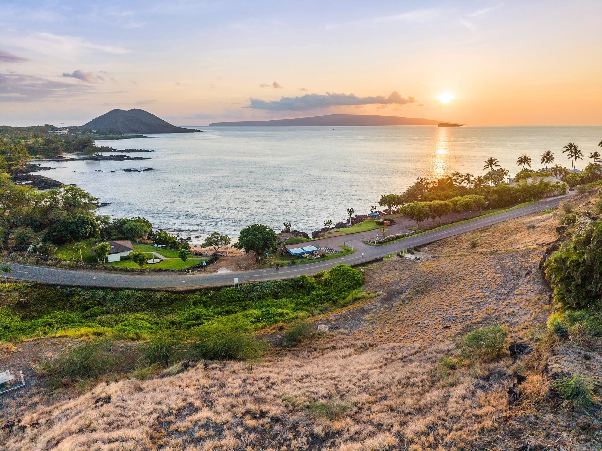 5147 Makena Road, Unit 5 Kihei, HI 96753 - Photo 14 of 18 a view of a lake with a mountain