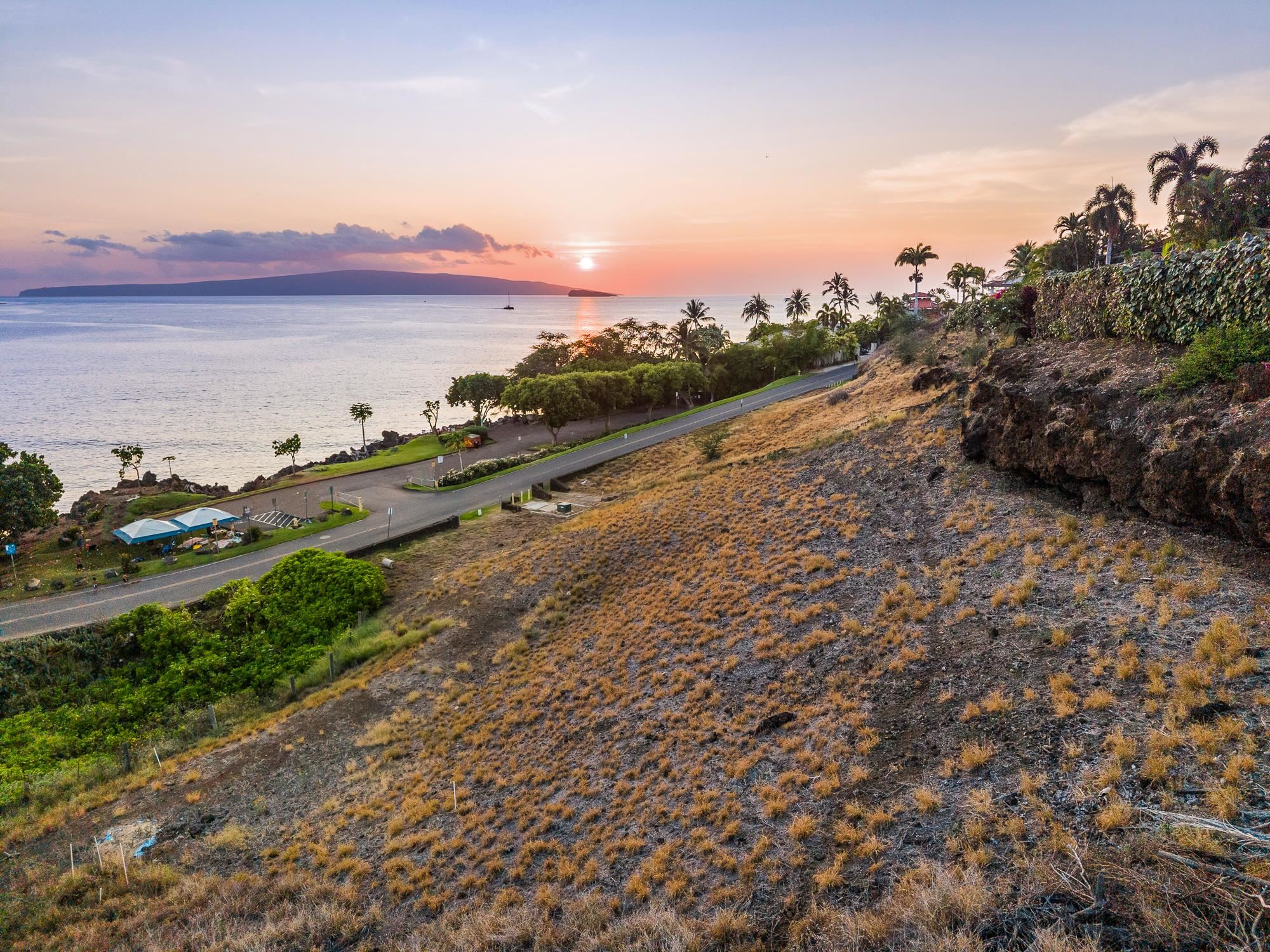 5147 Makena Road, Unit 5 Kihei, HI 96753 - Photo 15 of 18 a view of a road with an ocean view