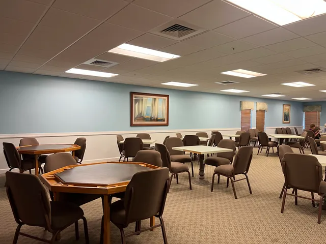a roof view with a dining table and chairs