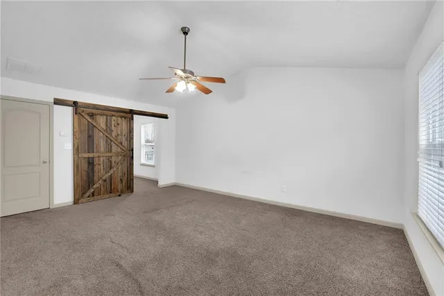 a bathroom with bathtub and a shower
