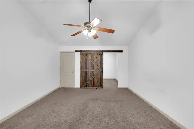 a backyard of a house with seating space